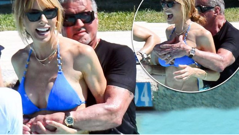 26 Years Together! Stallone, 77, was Spotted in the Pool with his Young Wife At 77 years old, Sylvester Stallone was captured alongside his wife during their vacation, and the stunning figure of Jennifer Flavin caught everyone’s attention.