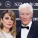 Richard Gere, 75, can't keep his hands off wife Alejandra, 41, as she wears bridal gown for red carpet......See more