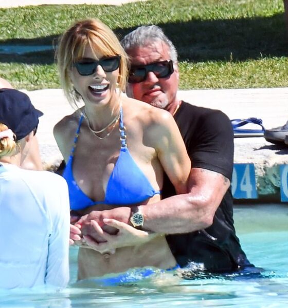 Sylvester Stallone is pictured enjoying himself in the pool with his wife 10 months after they called it quits